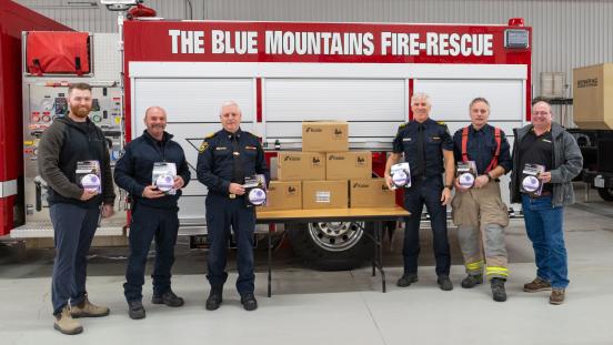 Enbridge Gas and Blue Mountains Fire Representatives with Donated Smoke Alarms and CO Detectors