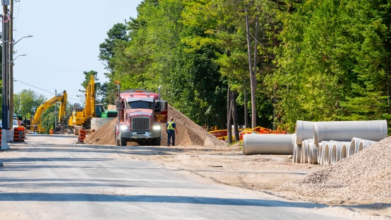 Material and construction equipment staged on Bay Street