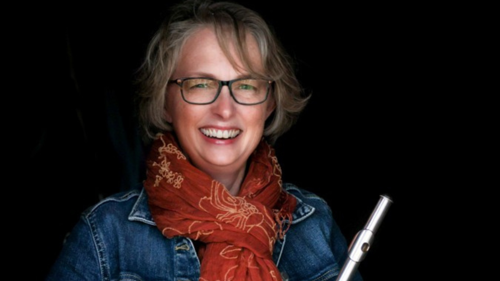 Woman holding a flute