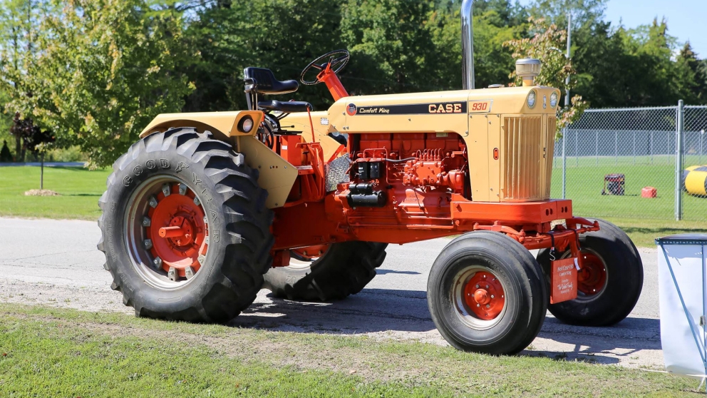 Vintage tractor parked on side of road