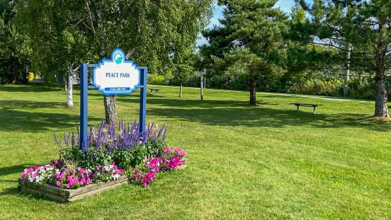 Peace Park sign in flower garden