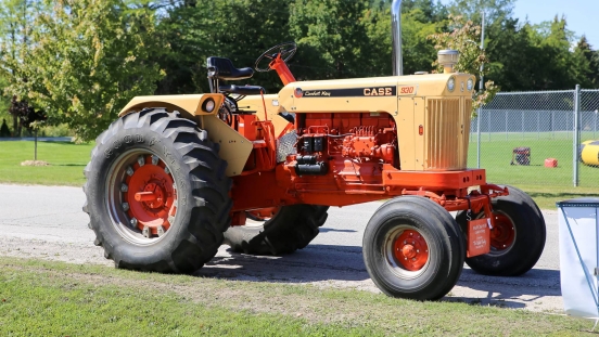 Vintage tractor parked on side of road