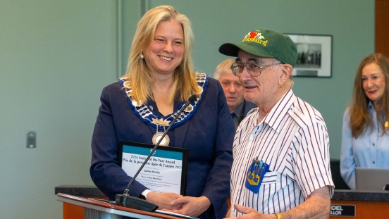 James Hindle receiving his award from Mayor Matrosovs in Council Chambers