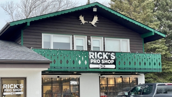 Exterior view of Rick's Pro Shop with sign hanging