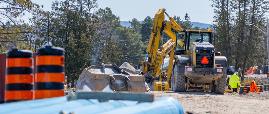 Construction equipment working in McAuley intersection