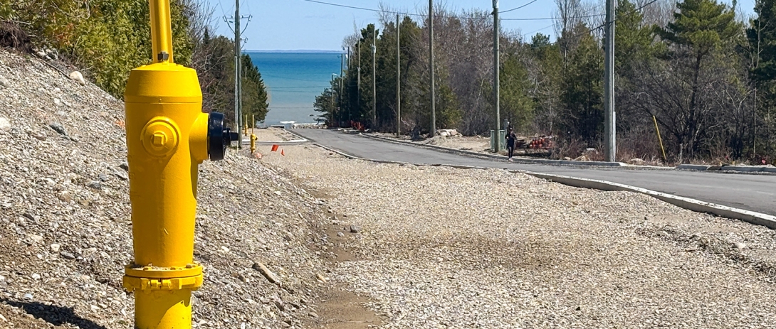 Fire hydrant at side of graveled area