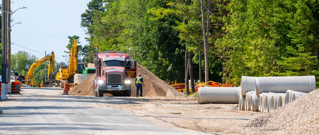 Material and construction equipment staged on Bay Street