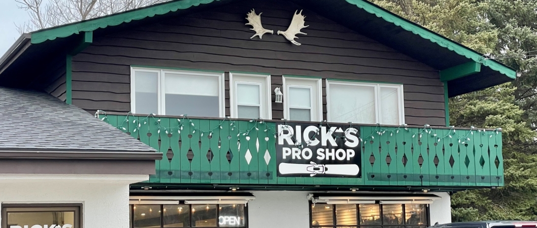Exterior view of Rick's Pro Shop with sign hanging