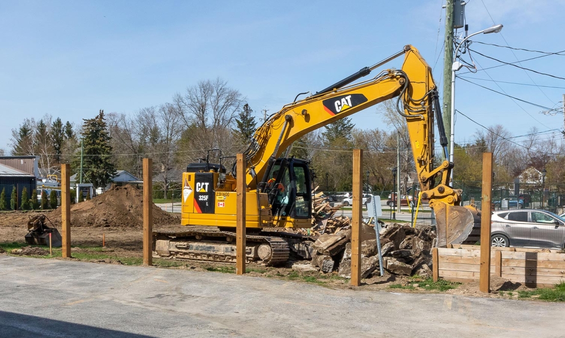 Construction equipment working on Arthur Street Parking Lot