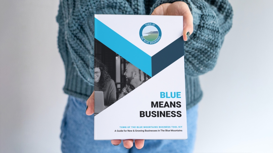 Person holding Business Toolkit