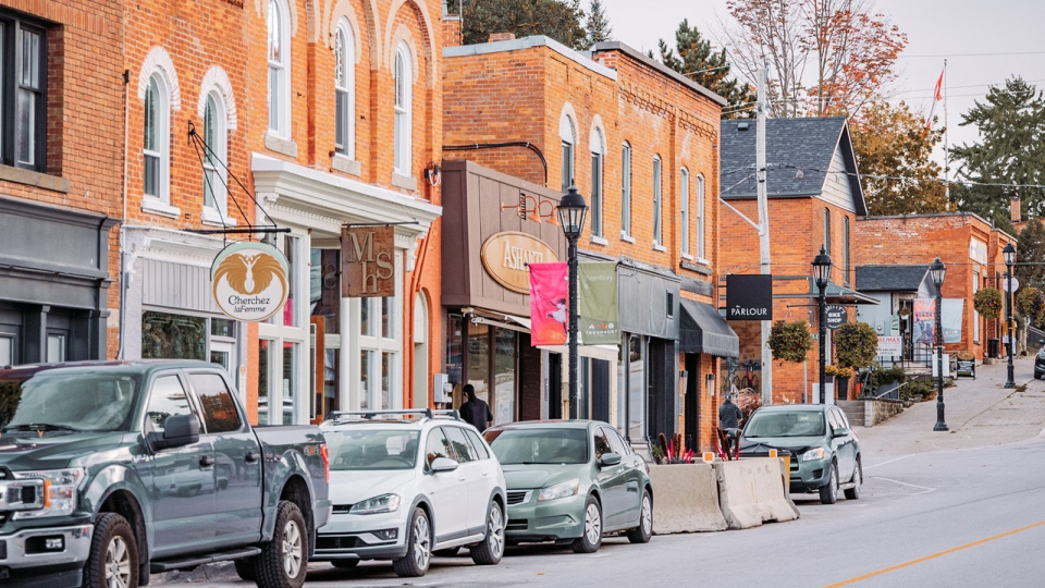 Cars parked in front of businesses in downtown Thornbury